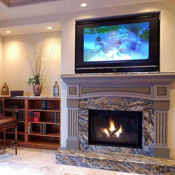 Wood Burning Fireplace with Tv mounted over it in Gaithersburg MD